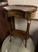 A Louis XVI style kidney top side table, with gilt brass gallery over a single drawer and upper