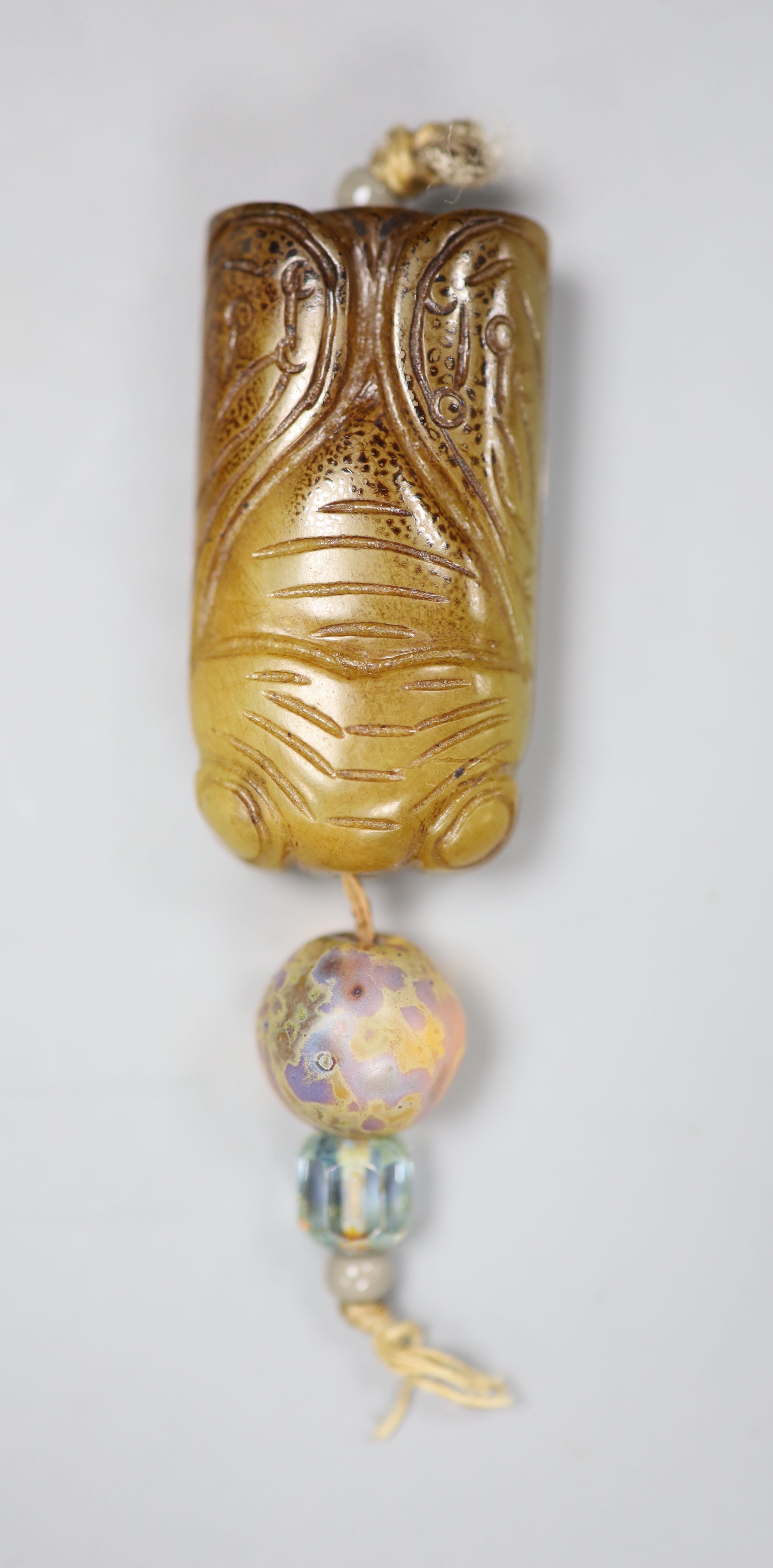 A Chinese jade cicada pendant, length 4cm