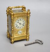 An early 20th century French brass carriage clock, with alarm, height 13.5cm with handle down