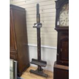 An early 20th century artist's studio easel, height 205cmCONDITION: It is sturdy and its