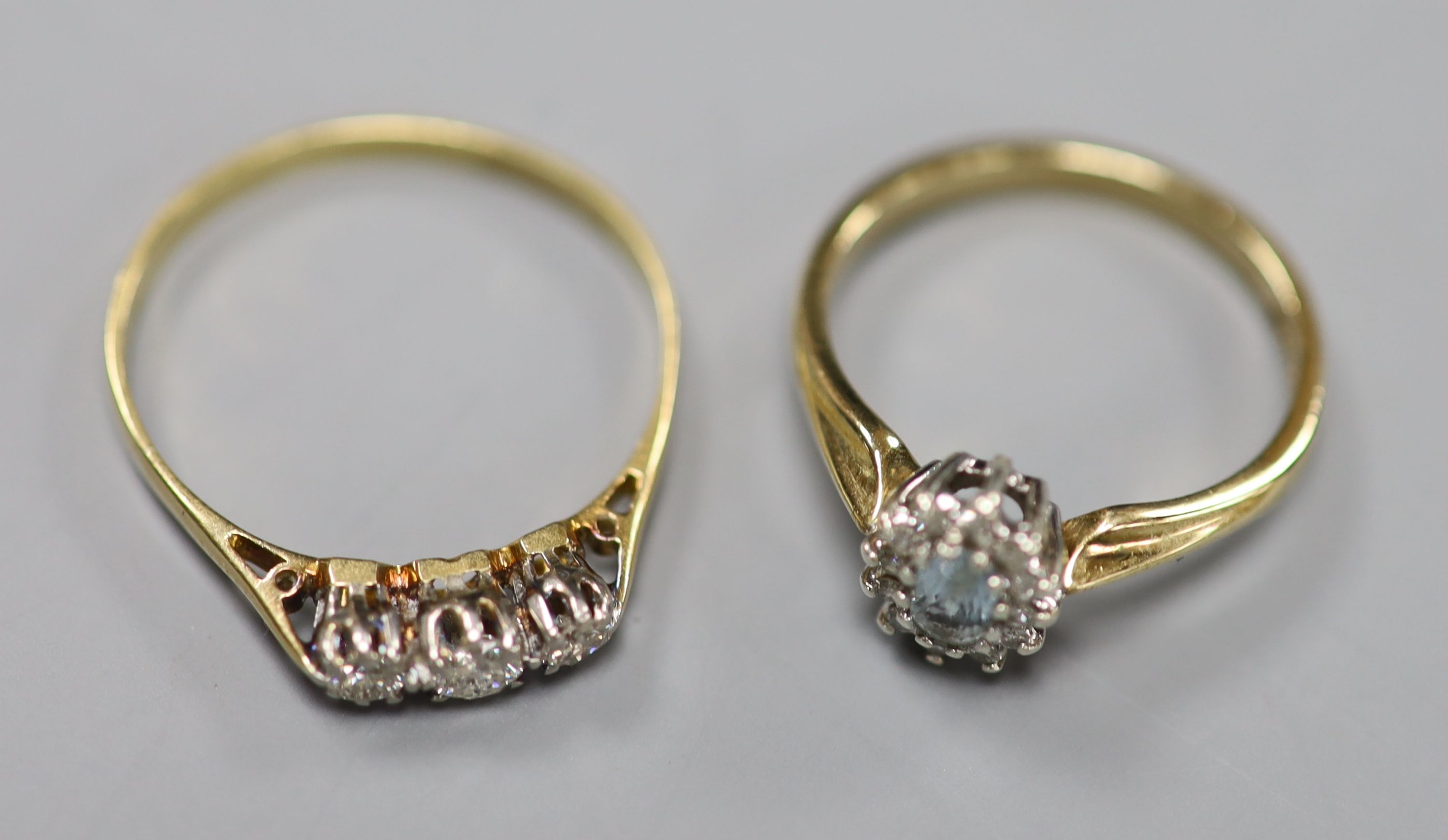 A yellow metal and three stone diamond ring, size Q, gross 1.7 grams and a modern 9ct gold, - Image 2 of 3