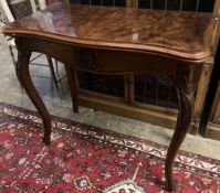 A 19th century French walnut serpentine folding tea table, width 85cm, depth 42cm, height 76cm