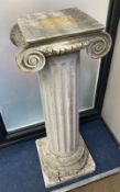 A reconstituted stone ionic garden pedestal, width 39cm, height 104cm