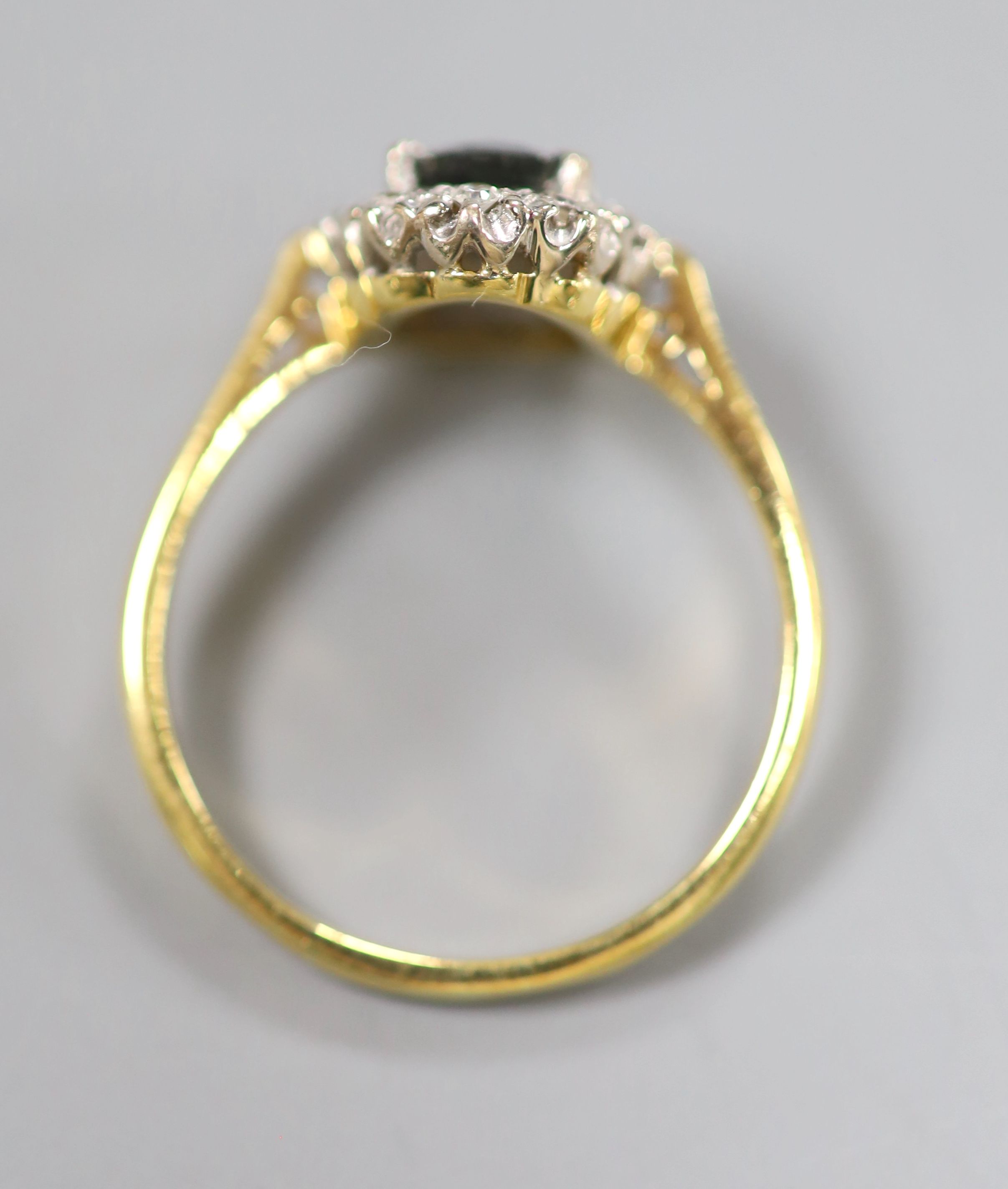 A modern 18ct gold, sapphire and diamond set oval cluster ring, size O, gross 3.2 grams. - Image 3 of 3