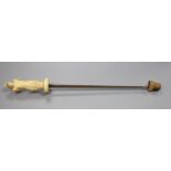 An 18th century German or Italian ivory hilt and guard. Length 41cm.