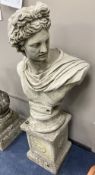 A reconstituted stone bust of a Roman Emperor, on a square plinth, height 122cm