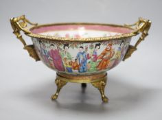 An early 19th century Chinese ormolu mounted famille rose bowl, 30cm handle to handle