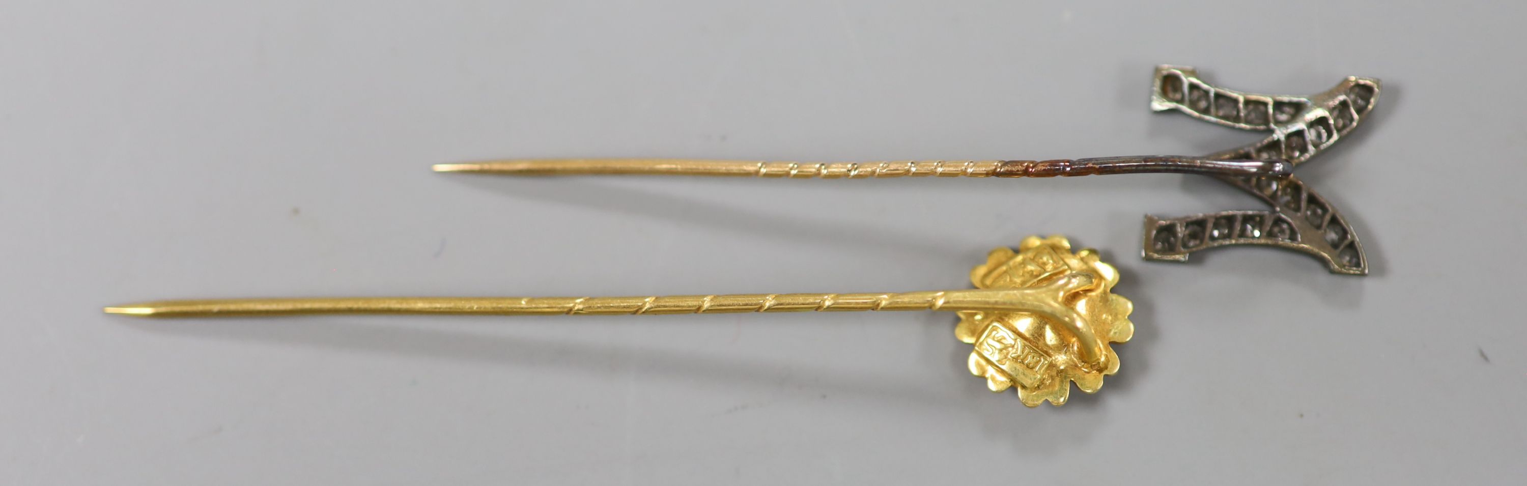 An early 20th century yellow metal and rose cut diamond set 'M' stick pin, 58mm, gross 1.8 grams and - Image 2 of 2
