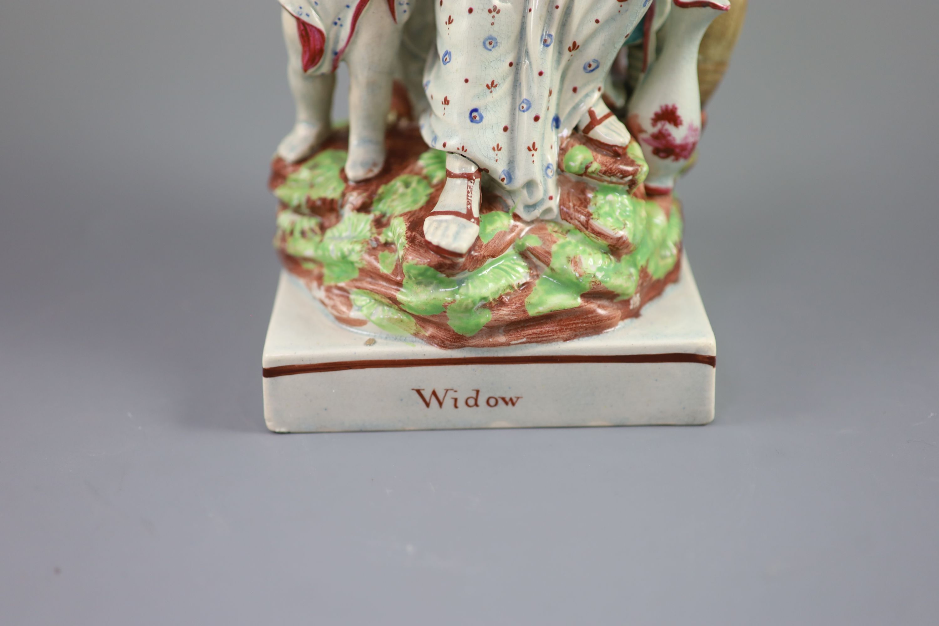 A Ralph Wood type group of a widow of Zarepeth with oil and barrel, c.1790-1810, on a titled - Image 3 of 6