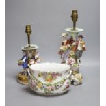 A Dresden figurative lamp, another similar lamp and a bowl with swags of flowers, tallest 28cm