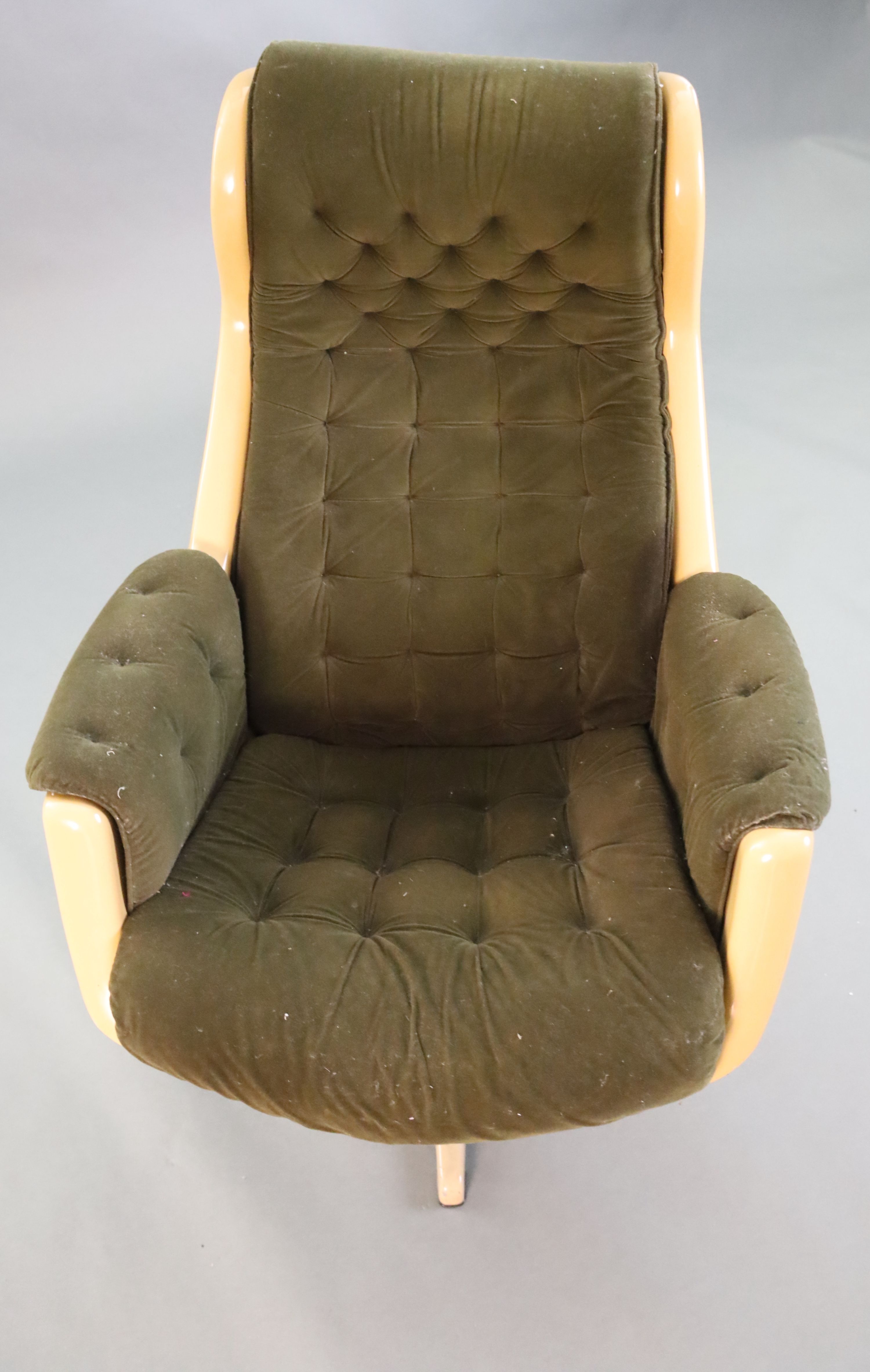 A Svensson and Sandstrom Swedish moulded plastic chair, upholstered in buttoned brown fabric with - Image 2 of 3