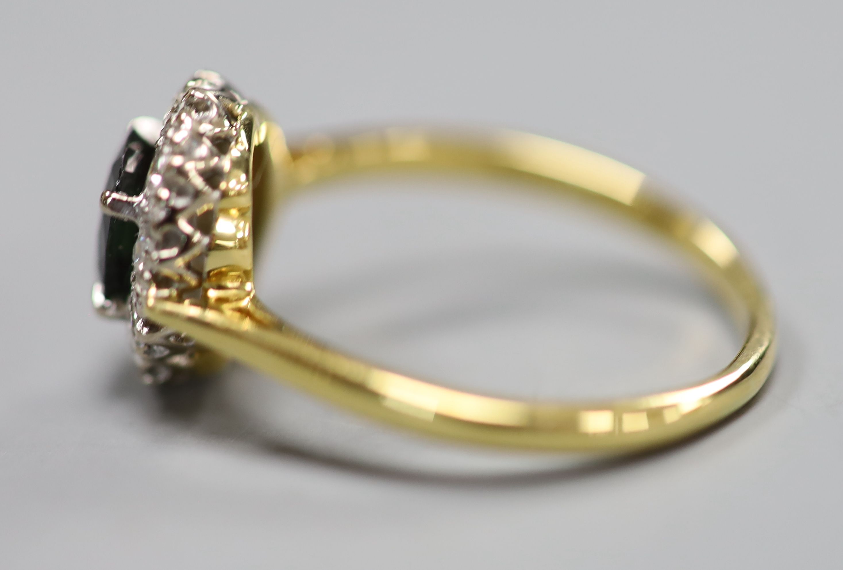 A modern 18ct gold, sapphire and diamond set oval cluster ring, size O, gross 3.2 grams. - Image 2 of 3