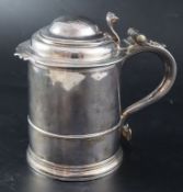 A late Queen Anne silver tankard, maker R?, London, 1713, 17.4cm, 21.5oz (a.f.).CONDITION: Quite