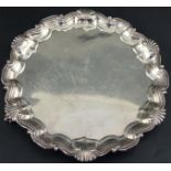 A late Victorian silver salver with shell and scroll border, Goldsmiths & Silversmiths Co Ltd,
