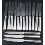 A harlequin set of fifteen mainly George IV silver handled table knives, approx. 27cm.CONDITION: