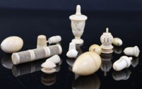 A collection of assorted early 19th century and later carved ivory sewing accessories including tape