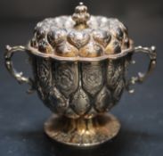 A George V 17th century style small silver two handled cup and cover, Goldsmiths & Silversmiths Co