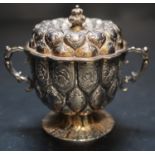 A George V 17th century style small silver two handled cup and cover, Goldsmiths & Silversmiths Co