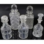 Five assorted Victorian and later cut glass decantersCONDITION: - a pair of ring collar decanters,