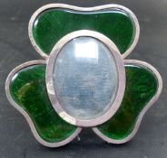A late Victorian silver and green enamel mounted shamrock photograph frame, Horton & Allday,