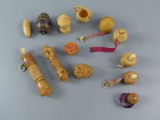 A collection of assorted 19th century carved and turned coquilla nut sewing