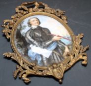 A 19th century French ormolu framed enamel plaque, depicting a 17th century explorer standing