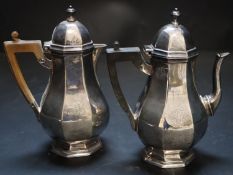 A pair of Edwardian silver café-au-lait pots, octagonal baluster bodies, monogrammed, Thomas