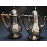A pair of Edwardian silver café-au-lait pots, octagonal baluster bodies, monogrammed, Thomas