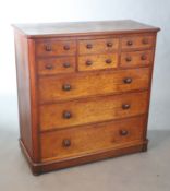 A Victorian mahogany chest, fitted central double dummy deep drawer flanked by four short drawers