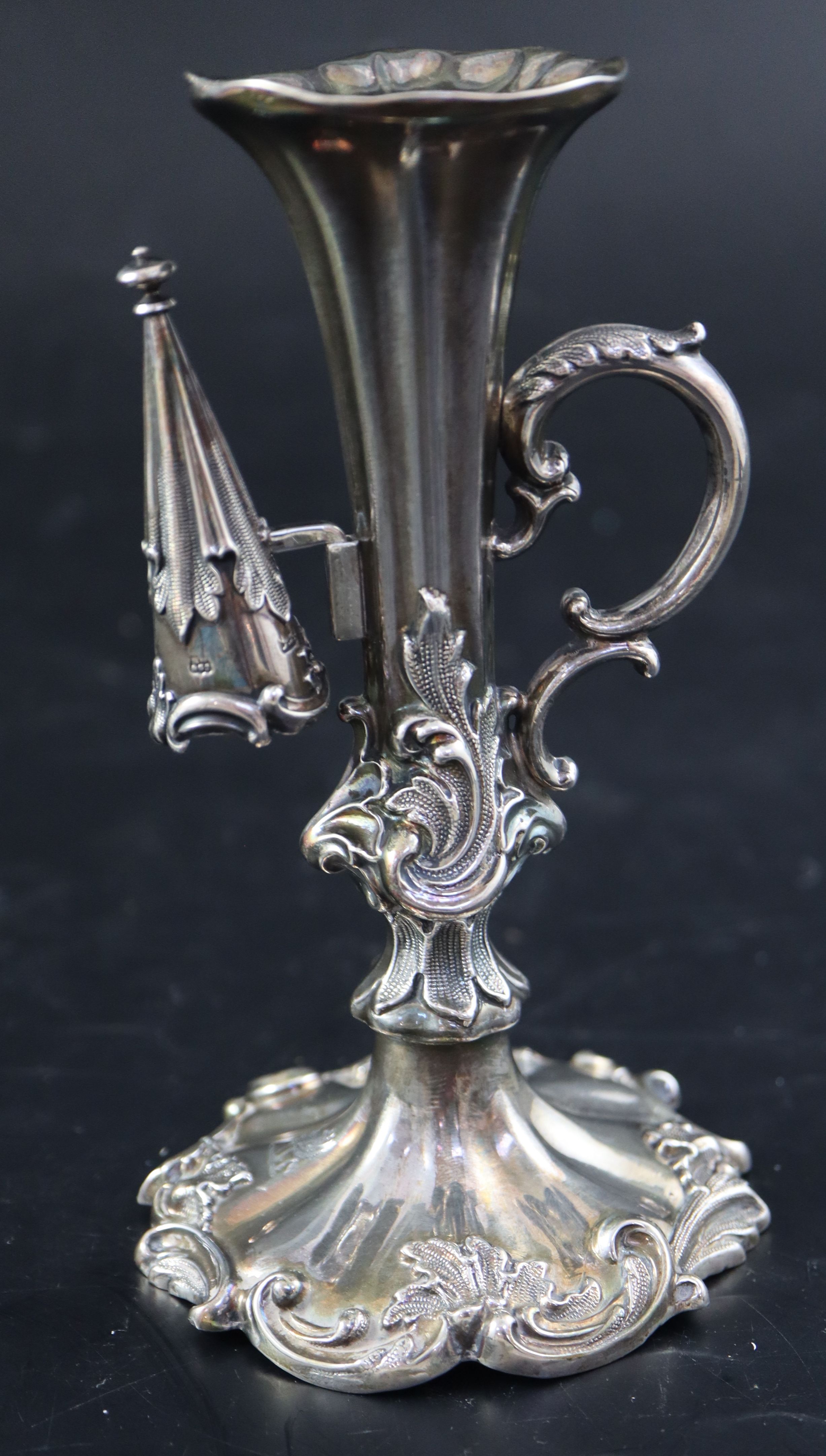 An ornate Victorian silver chamberstick, Henry Wilkinson & Co, Sheffield, 1842, snuffer 1839, 14.