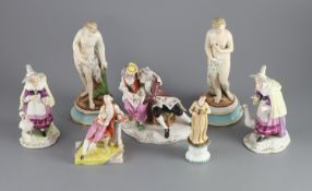 Seven assorted Continental porcelain figures, including a Dresden group of loversCONDITION: -
