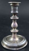 A Queen Anne silver candlestick, Benjamin Pyne, London, 1705, 19cm, 14.5oz.CONDITION: Very