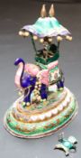 An Indian enamelled white metal miniature elephant with howdah, height 13.7cm, gross 295 grams.