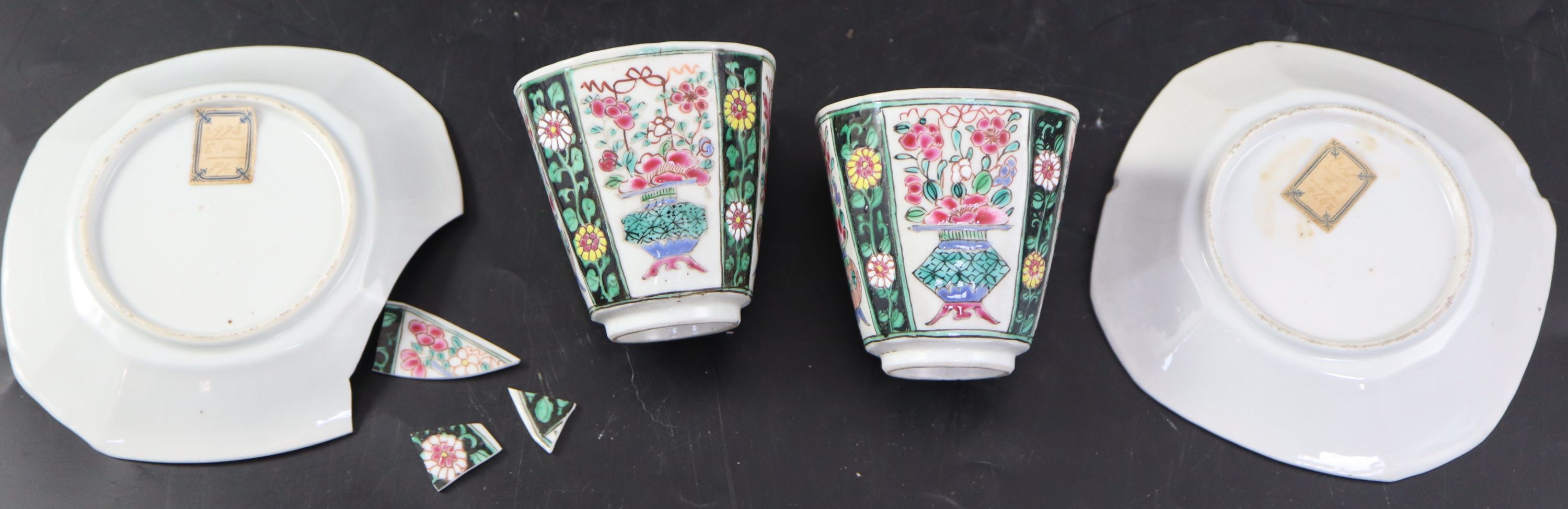 A pair of Chinese Qianlong famille rose octagonal cups and saucers, with panelled floral decoration, - Image 6 of 7