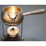 An Edwardian silver brandy warmer and stand with burner, Hukin & Heath, London, 1902/3, height 11.