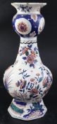 A 19th century faience octagonal vase, height 36cm (a.f.)CONDITION: Minor chipping around the