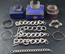 A group of assorted bracelets and bangles, including one Swedish textured white metal, one stamped