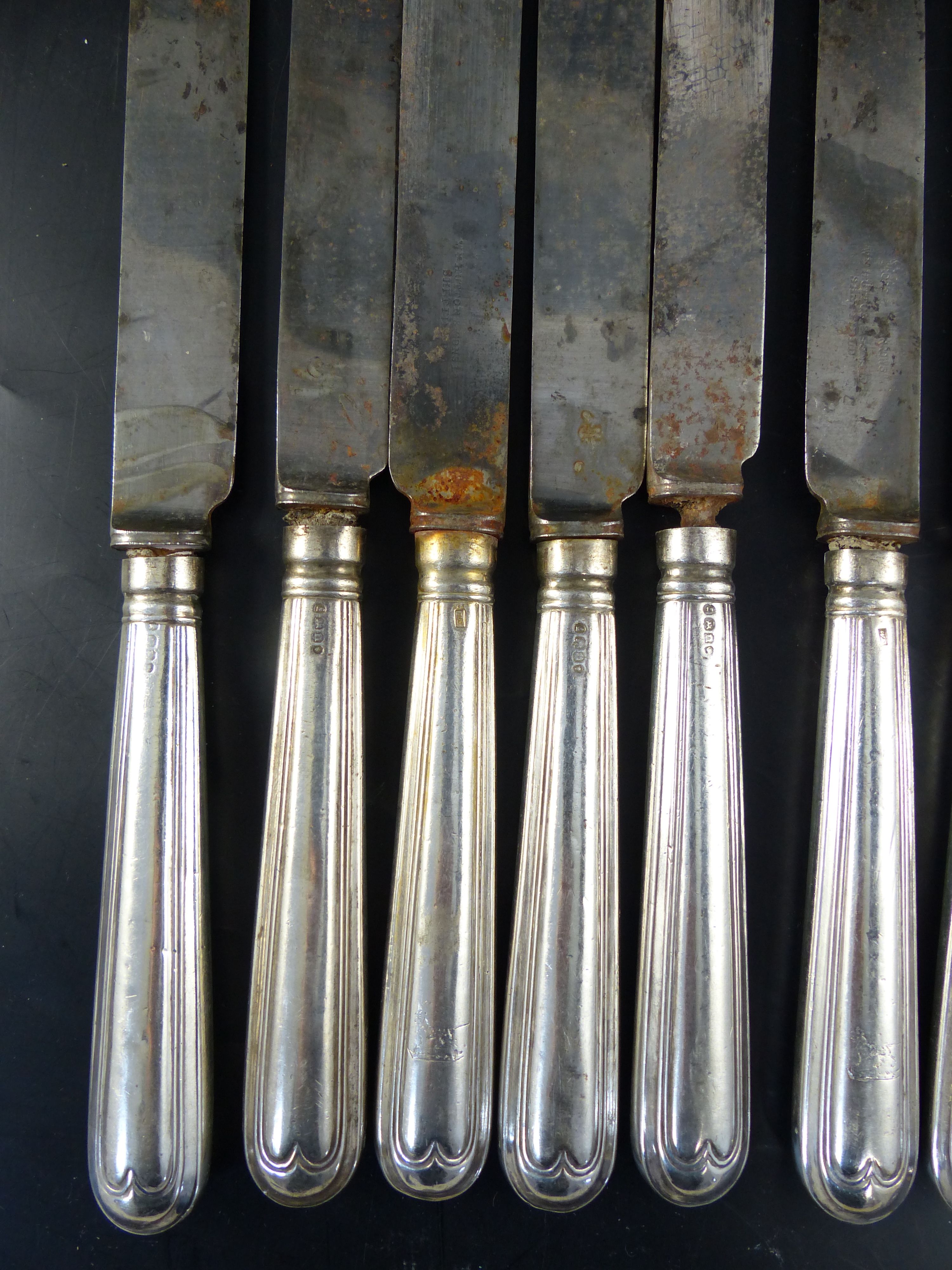 A set of twelve George IV silver handled thread pattern table knives, London, 1828 and two others ( - Image 6 of 9