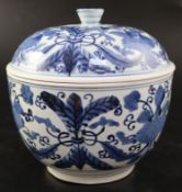 A Japanese blue and white tureen and cover, c.1700, painted in underglaze blue with stylised flowers