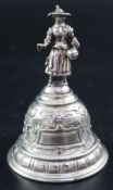 A Victorian continental silver hand bell, with figural handle (lacks clapper), import marks for