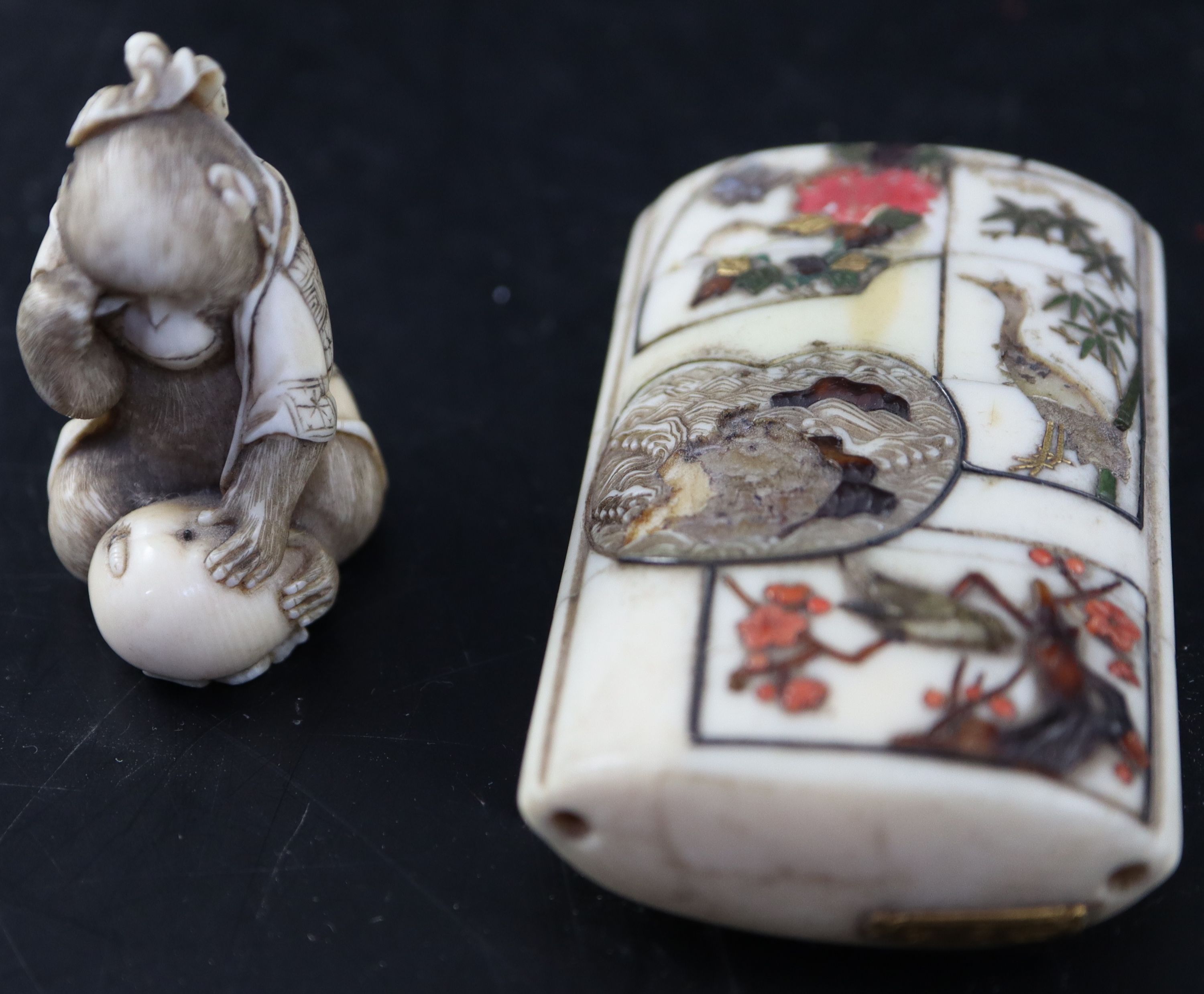A Japanese Meiji period ivory and shibayama three division inro, decorated with panels of birds