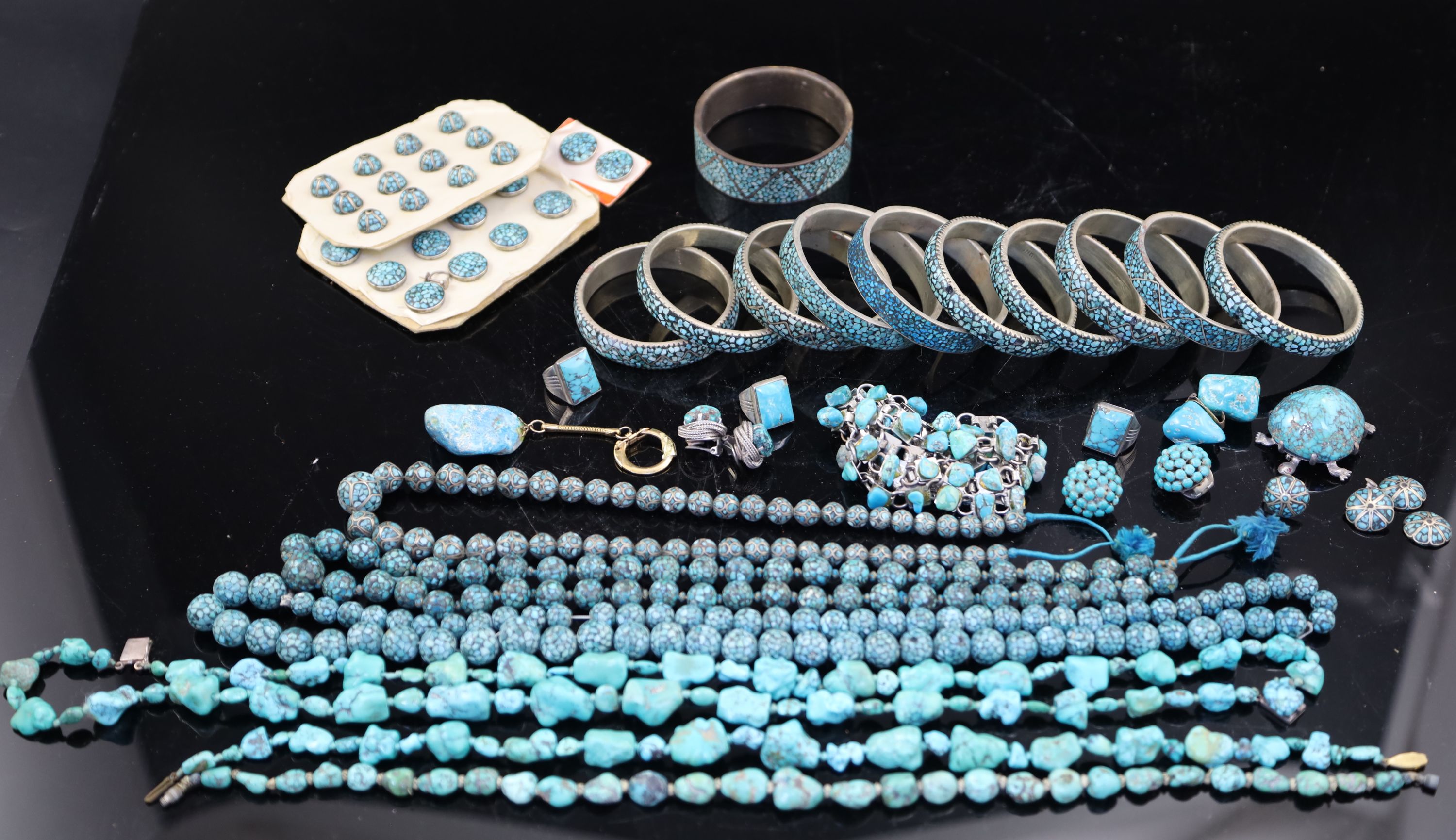 A quantity of assorted mainly continental turquoise set jewellery including necklaces, rings,