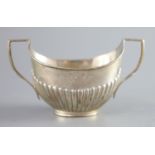 A Victorian demi fluted silver two handled oval sugar bowl, Edward Hutton, London 1893, width 15.