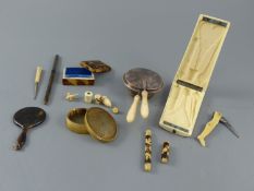 A collection of assorted 18th century and later sewing accessories and objets d'art including a horn