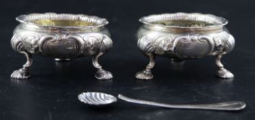 A pair of Victorian embossed silver bun salts, Daniel & Charles Houle, London, 1845, 78mm and a