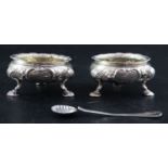 A pair of Victorian embossed silver bun salts, Daniel & Charles Houle, London, 1845, 78mm and a