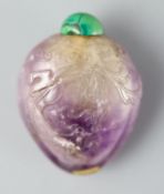 A Chinese amethyst crystal snuff bottle, 1800-1900, of flattened ovoid form, finely carved in relief