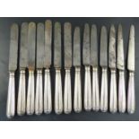 A set of twelve George IV silver handled thread pattern table knives, London, 1828 and two others (