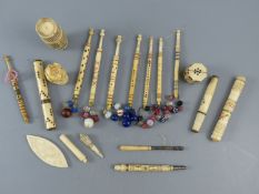 A collection of assorted 19th century stained ivory and bone sewing implements including