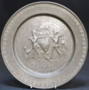 Two century style Continental pewter dishes, decorated with Adam & Eve and grape pickersCONDITION: